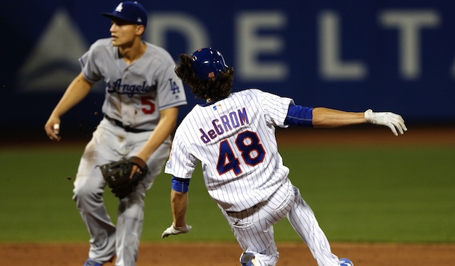 Los Angeles Dodgers shortstop Corey Seager waits for a throw