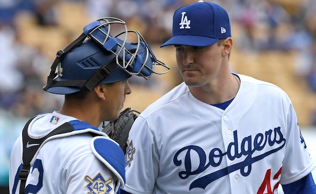 Los Angeles Dodgers catcher Austin Barnes speaks with Ross Stripling