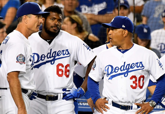 Bob Geren, Yasiel Puig, Dave Roberts, Chris Woodward