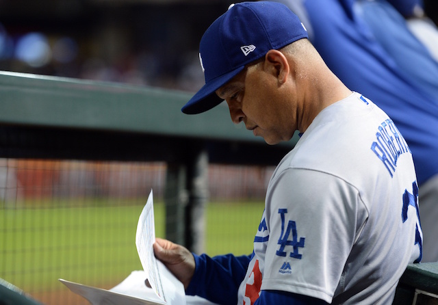 Los Angeles Dodgers manager Dave Roberts in the dugout at Chase Field