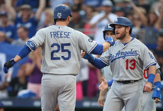 Los Angeles Dodgers infielder David Freese celebrates with Russell Martin after hitting a grand slam