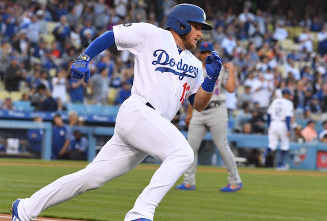 Los Angeles Dodgers infielder Max Muncy runs on an RBI double against the New York Mets