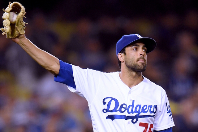 Los Angeles Dodgers relief pitcher Scott Alexander reacts after allowing a grand slam against the New York Mets