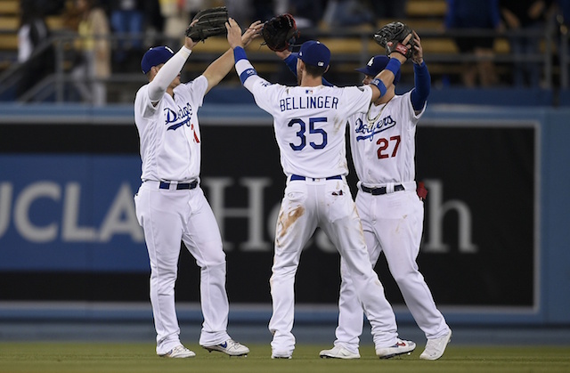 Cody Bellinger, Joc Pederson and Alex Verdugo celebrate a Los AngelesDodgers win against the Philadelphia Phillies