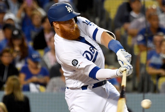 Los Angeles Dodgers third baseman Justin Turner hits his 100th career home run