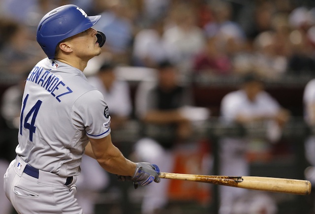 Los Angeles Dodgers second baseman Kiké Hernandez hits a home run against the Arizona Diamondbacks