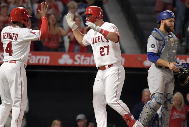 Los Angeles Dodgers catcher Russell Martin looks on after Los Angels Angels of Anaheim center fielder Mike Trout hit a home run