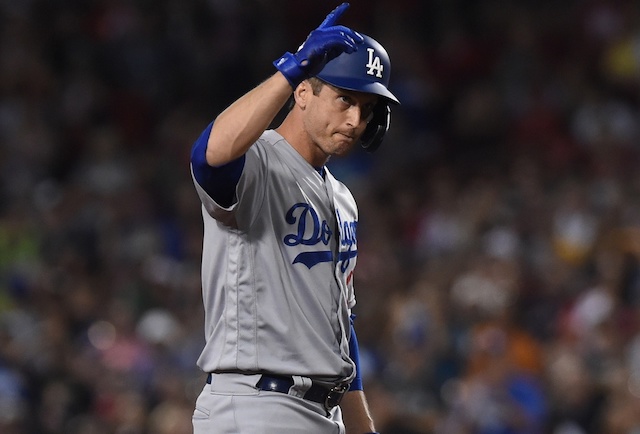 Los Angeles Dodgers first baseman David Freese celebrates after hitting a double against the Boston Red Sox