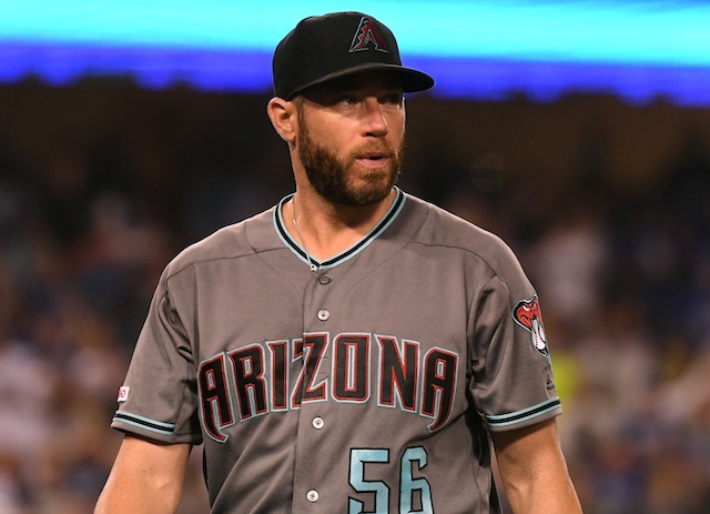 Arizona Diamondbacks closer Greg Holland reacts after issuing a walk to tie a game with the Los Angeles Dodgers