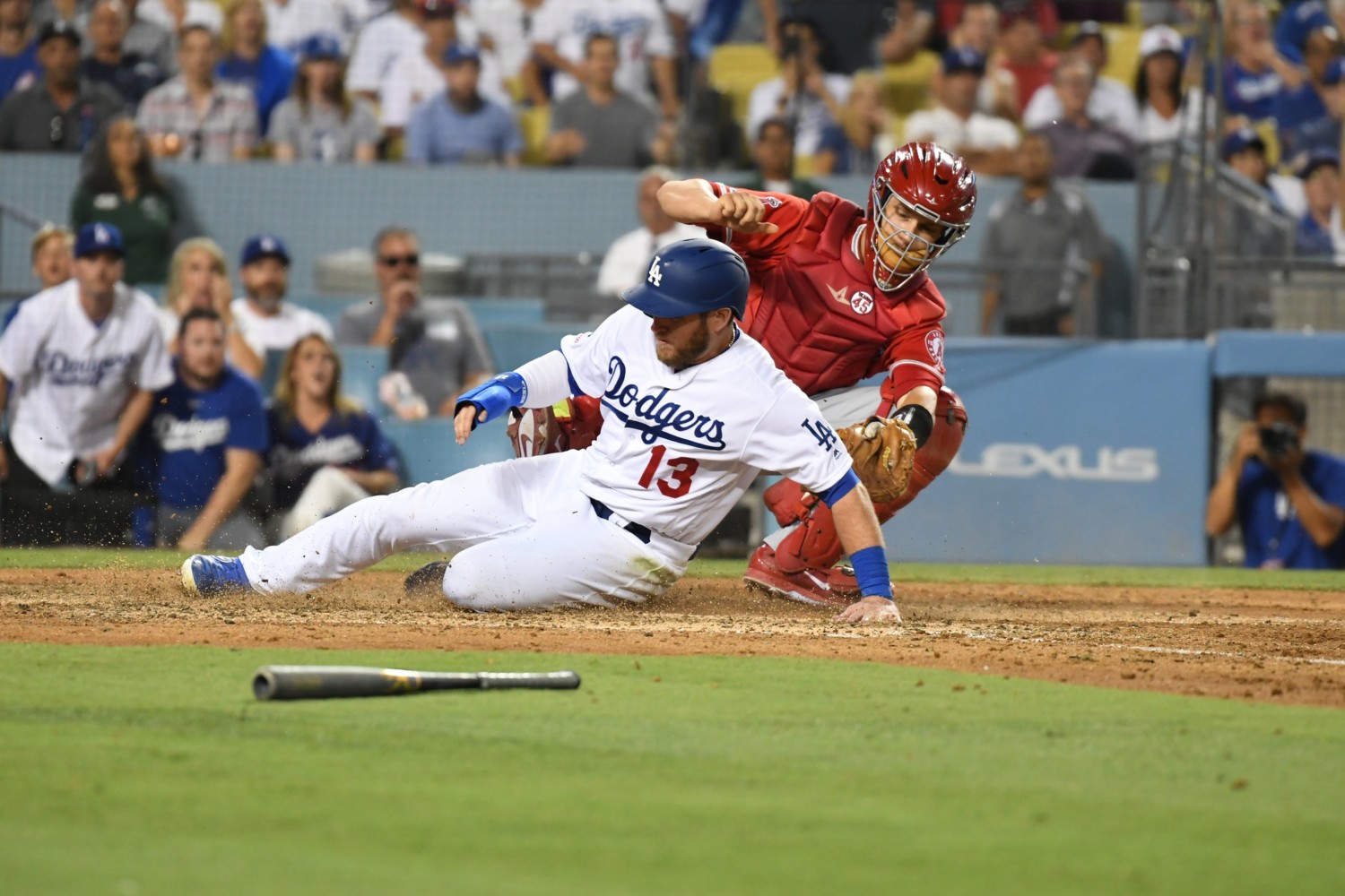 Los Angeles Dodgers first baseman Max Muncy scores a run