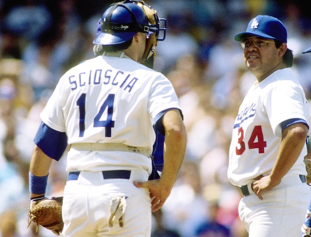 Los Angeles Dodgers teammates Mike Scioscia and Fernando Valenzuela during a game at Dodger Stadium