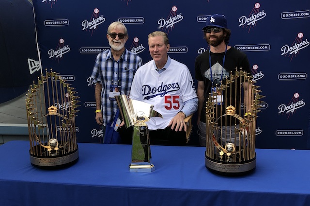 Orel Hershiser poses with World Series trophies during 2018 Dodgers All-Access at Dodger Stadium