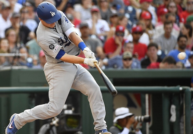 Los Angeles Dodgers catcher Will Smith hits a three-run double against the Washington Nationals