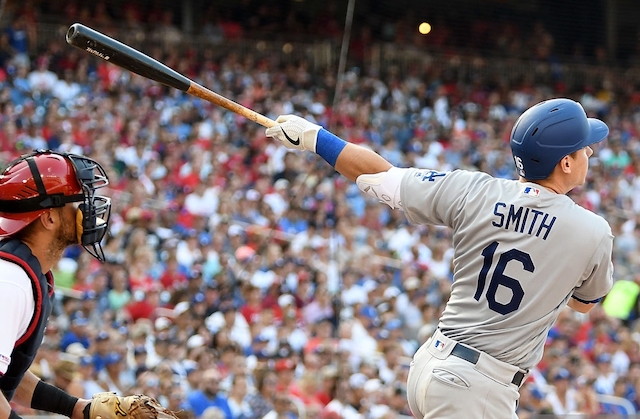 Los Angeles Dodgers catcher Will Smith hits a three-run double against the Washington Nationals