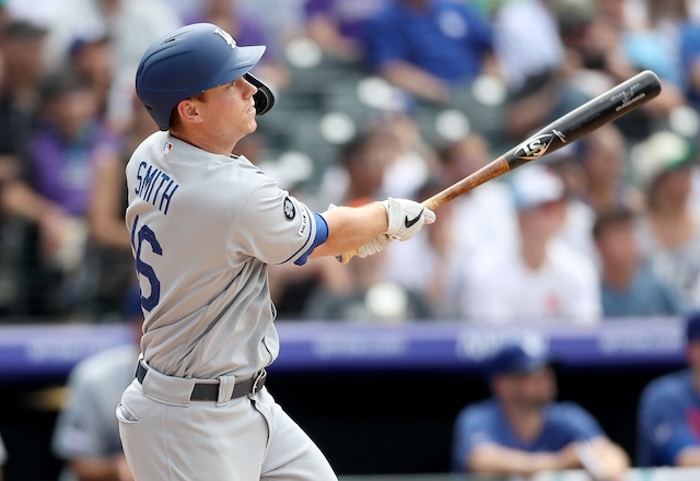 Los Angeles Dodgers catcher Will Smith watches his home run