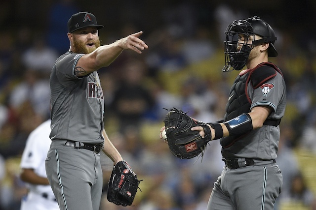 Arizona Diamondbacks closer Archie Bradley yells at the Los Angeles Dodgers dugout