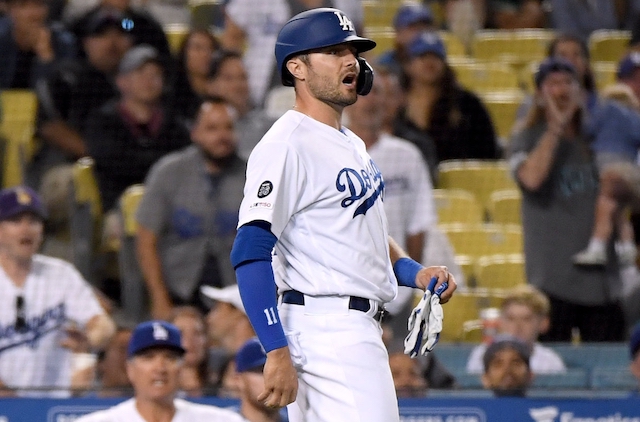 Los Angeles Dodgers center fielder A.J. Pollock reacts to Arizona Diamondbacks pitcher Archie Bradley