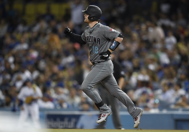 Arizona Diamondbacks catcher Carson Kelly rounds the bases after hitting a home run against the Los Angeles Dodgers