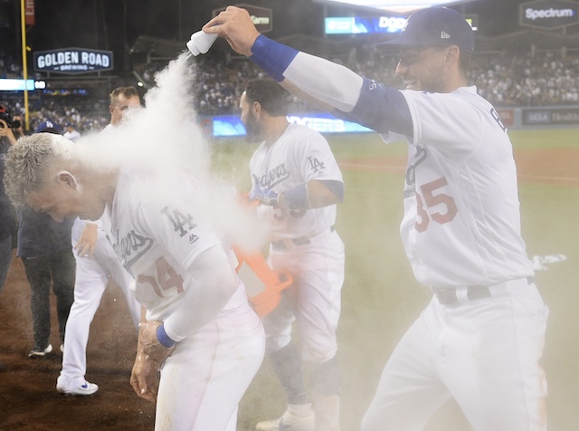 Cody Bellinger, Kiké Hernandez and Russell Martin celebrate a Los Angels Dodgers walk-off win