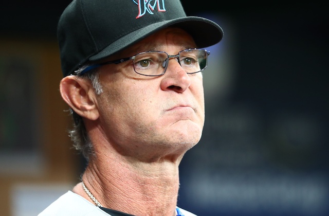 Miami Marlins manager Don Mattingly looks on from the dugout