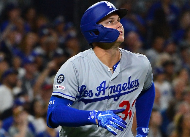 Los Angeles Dodgers outfielder Joc Pederson watches a home run