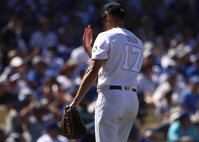 Los Angeles Dodgers relief pitcher Joe Kelly walks off the field after facing the New York Yankees