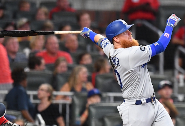 Los Angeles Dodgers third baseman Justin Turner hits a home run