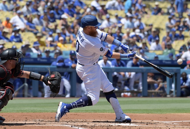 Los Angeles Dodgers third baseman Justin Turner hits a home run against the Arizona Diamondbacks