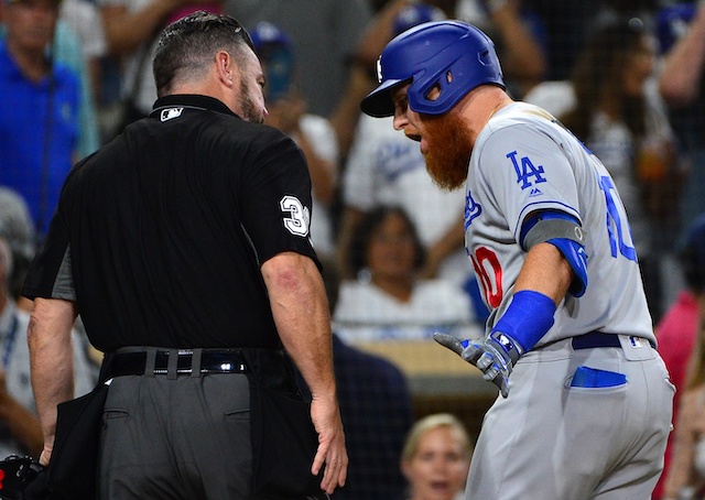 Los Angeles Dodgers third baseman Justin Turner argues with umpire Rob Drake