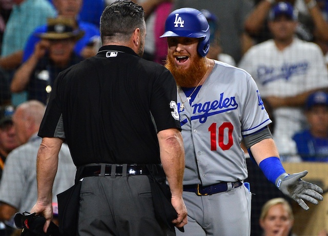 Los Angeles Dodgers third baseman Justin Turner argues with umpire Rob Drake