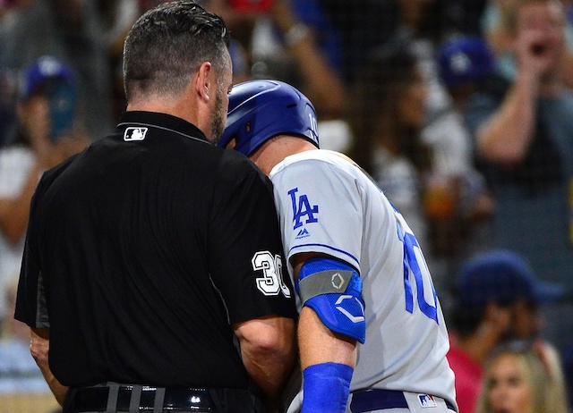 Los Angeles Dodgers third baseman Justin Turner argues with umpire Rob Drake