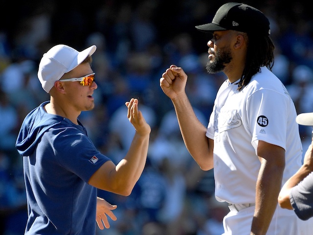 Los Angeles Dodgers teammates Kiké Hernandez and Kenley Jansen celebrate after a win against the New York Yankees