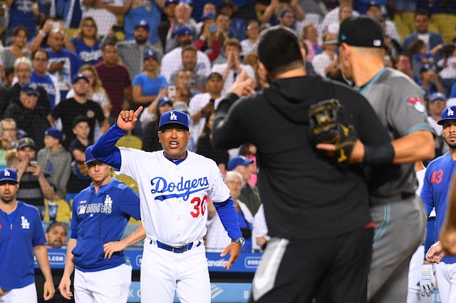 Los Angeles Dodgers manager Dave Roberts yells at Arizona Diamondbacks starter Robbie Ray during a benches-clearing incident