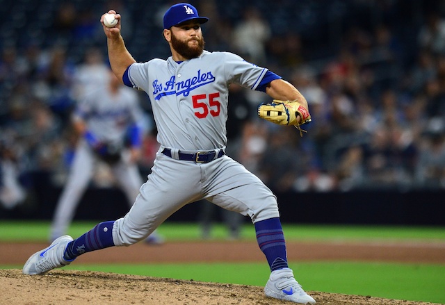 Los Angeles Dodgers catcher Russell Martin pitches against the San Diego Padres