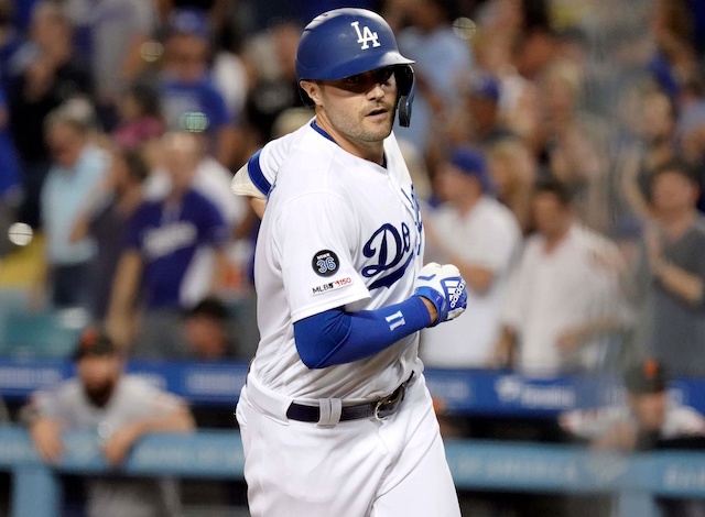 Los Angeles Dodgers outfielder A.J. Pollock crosses home plate after hitting a home run