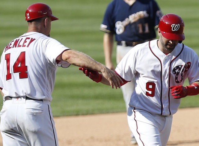 Washington Nationals second baseman Brian Dozier rounds the bases after hitting a home run against the Milwaukee Brewers