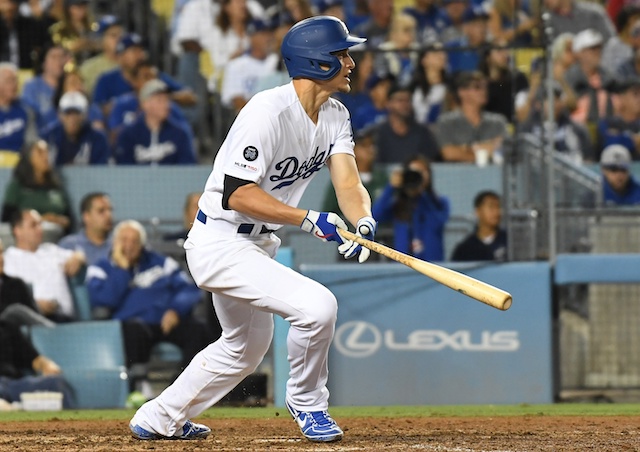 Los Angeles Dodgers shortstop Corey Seager hits a double against the Tampa Bay Rays