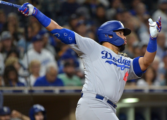 Los Angeles Dodgers infielder Edwin Rios hits a home run against the San Diego Padres