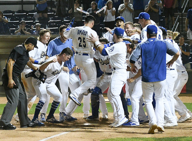 Rancho Cucamonga Quakes infielder Jacob Amaya hits a home run against the Lake Elsinore Storm in Game 3 of a 2019 California League Playoffs series