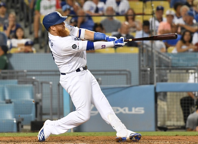 Los Angeles Dodgers third baseman Justin Turner hits a home run