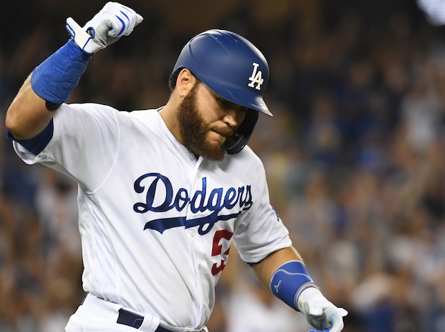 Los Angeles Dodgers catcher Russell Martin celebrates after a home run against the Colorado Rockies