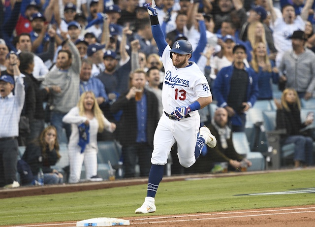 Los Angeles Dodgers infielder Max Muncy rounds the bases after hitting a home run during Game 5 of the 2019 NLDS