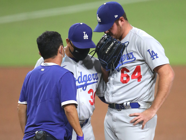 Caleb Ferguson, Dave Roberts, Dodgers trainer