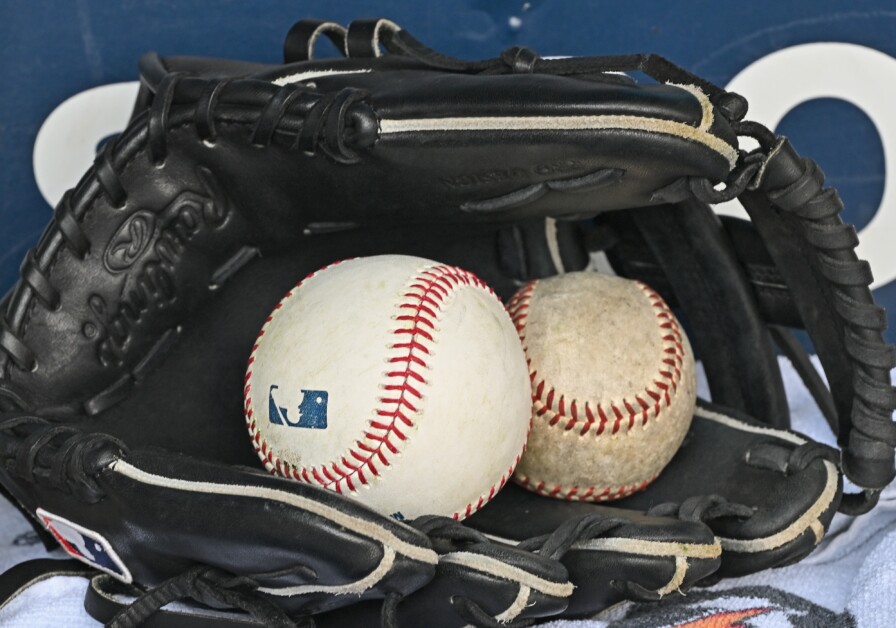 General view of baseballs, glove