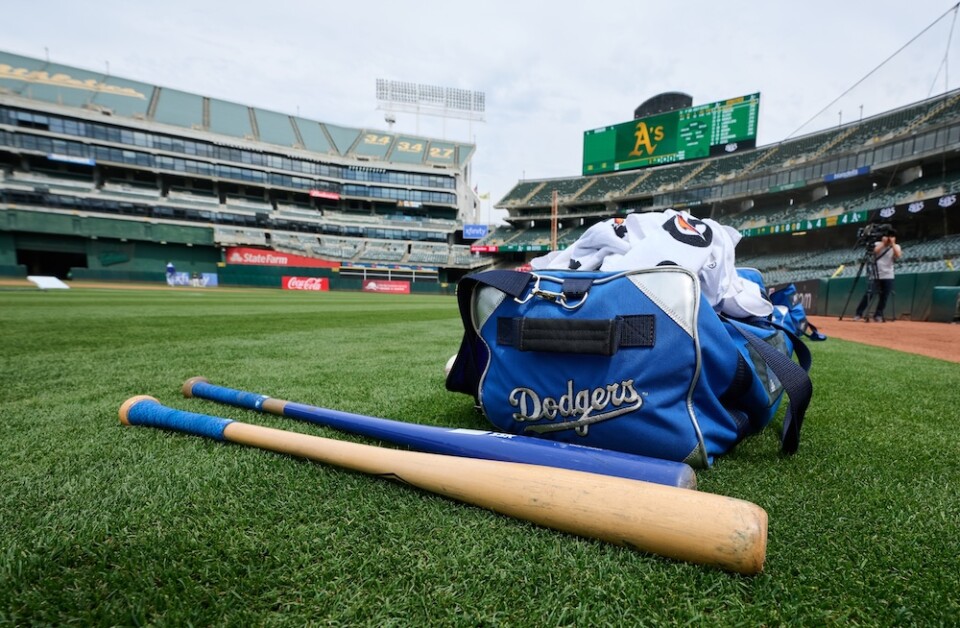 Dodgers workout bag, bats